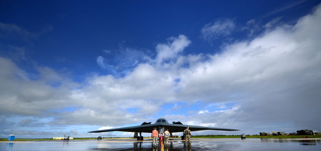 U.S. Air Force maintenance technicians assigned to the 509th Aircraft Maintenance Squadron, Whiteman Air Force Base, Mo., communicate with a B-2 Spirit pilot during pre-flight checks prior to a local training mission at Anderson Air Force Base, Guam Jan. 12, 2017. Close to 200 Airmen from Whiteman Air Force Base, Mo., and Barksdale Air Force Base, La., deployed to Andersen AFB, in support of U.S. Strategic Command Bomber and Deterrence missions. USSTRATCOM bomber missions familiarize aircrew with airbases and operations in different Geographic Combatant Commands. (U.S. Air Force photo by Tech. Sgt. Andy M. Kin)