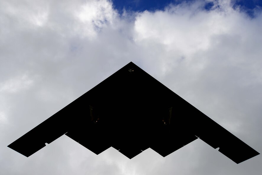 A U.S. Air Force B-2 Spirit aircraft deployed from Whiteman Air Force Base, Mo., flies overhead while returning from a local training mission at Andersen Air Force Base, Guam, Jan. 12, 2017. Close to 200 Airmen and three B-2s deployed from Whiteman Air Force Base, Mo., and Barksdale Air Force Base, La., in support of U.S. Strategic Command Bomber Assurance and Deterrence missions. USSTRATCOM units regularly conduct training with and in support of the Geographic Combatant Commands. USSTRATCOM, through its global strike assets, helps maintain global stability and security while enabling units to become familiar with operations in different regions. (U.S. Air Force photo by Tech. Sgt. Andy M. Kin)