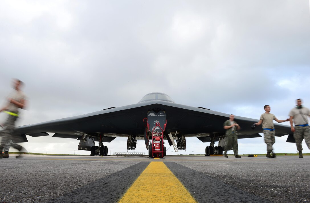 A U.S. Air Force B-2 Spirit deployed from Whiteman Air Force Base, Mo., receives routine maintenance at Andersen Air Force Base, Guam, Jan. 19, 2017. Close to 200 Airmen and three B-2s deployed from Whiteman Air Force Base, Mo., and Barksdale Air Force Base, La., to conduct local sorties and regional training and integrate with regional allies in support of Bomber Assurance and Deterrence missions. (U.S. Air Force photo by Airman 1st Class Jazmin Smith)