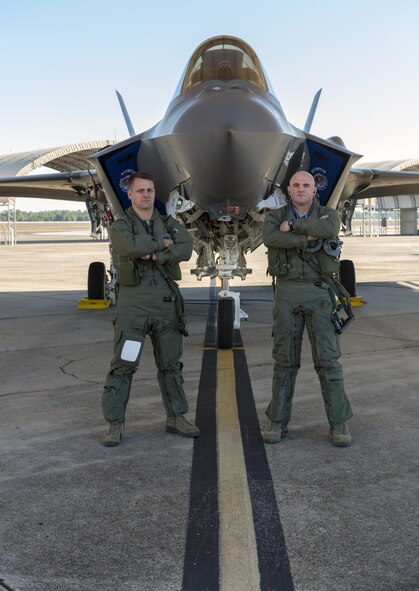 Florida Air National Guard pilots Lt. Col. Scott Charlton (Left) and Maj. John MacRae (Right) stand in front of the F-35A Lightning II at Eglin Air Force Base, January 24, 2017. The Florida Guardsmen are F-35 instructor pilots with the 58th Fighter Squadron based at Eglin and are responsible for teaching pilots how to fly the Department of Defense’s newest aircraft.