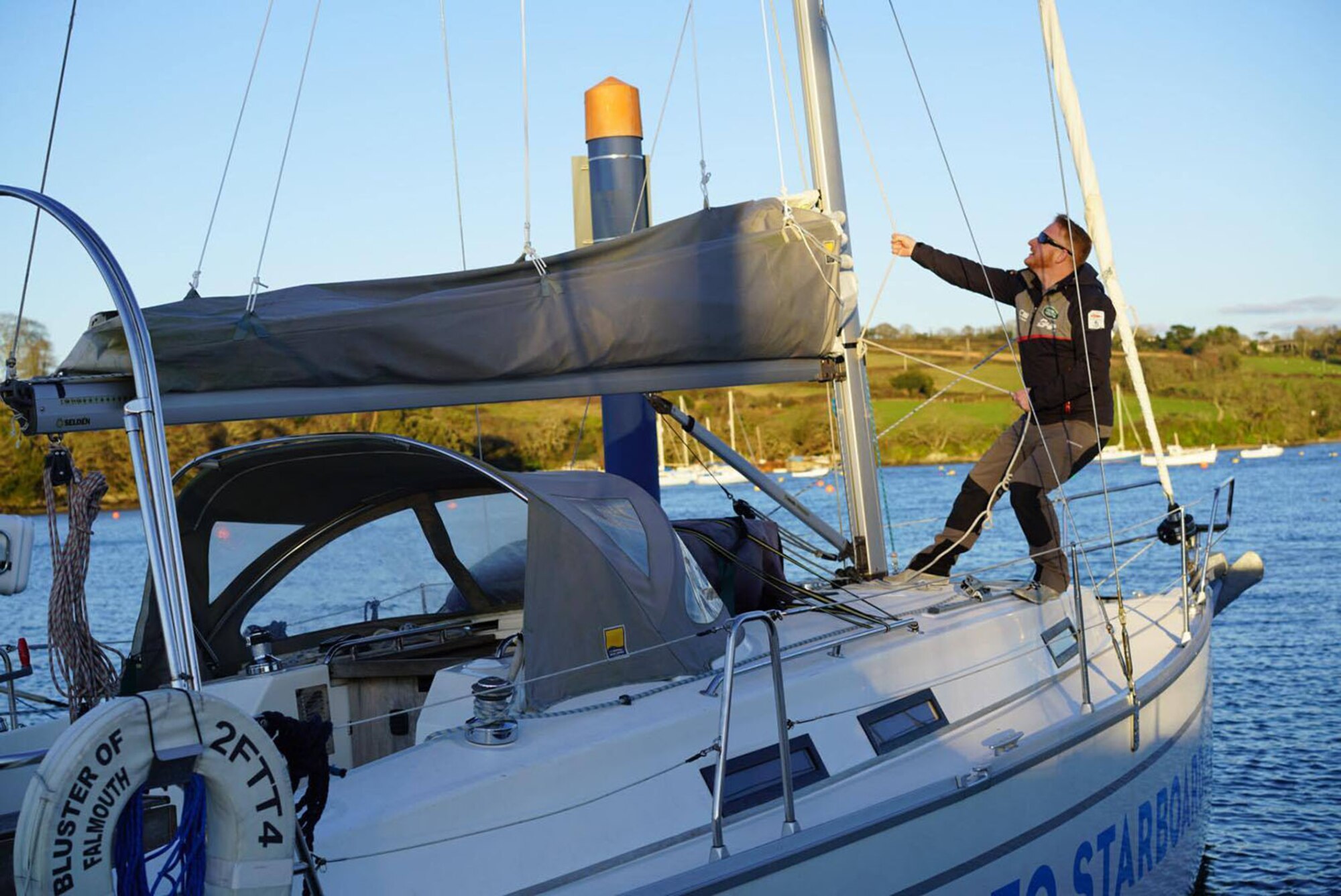 Ray Hoogendijk, 100th Force Support Squadron Outdoor Recreation program manager, instructs students on how to raise sails on a 34-foot training yacht Jan. 25, 2017, in Cornwall, England. Hoogendijk spent 16 years in the British Army and has a wealth of experience organizing outdoor activities including surfing, adventure training, mountain climbing and hiking. He organizes trips and activities around the U.K. for Team Mildenhall Airmen and their families. (Courtesy photo)