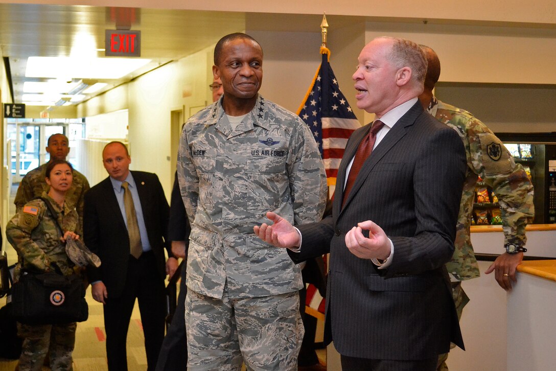 Roy Dillard, deputy director of Clothing and Textiles, talks to Air Force Gen. Darren McDew, commander of U.S. Transportation Command, about how the supply chain supports the warfighter with uniforms, protective equipment and much more. McDew was in Philadelphia Jan. 19 to learn about DLA Troop Support’s supply chains. 
