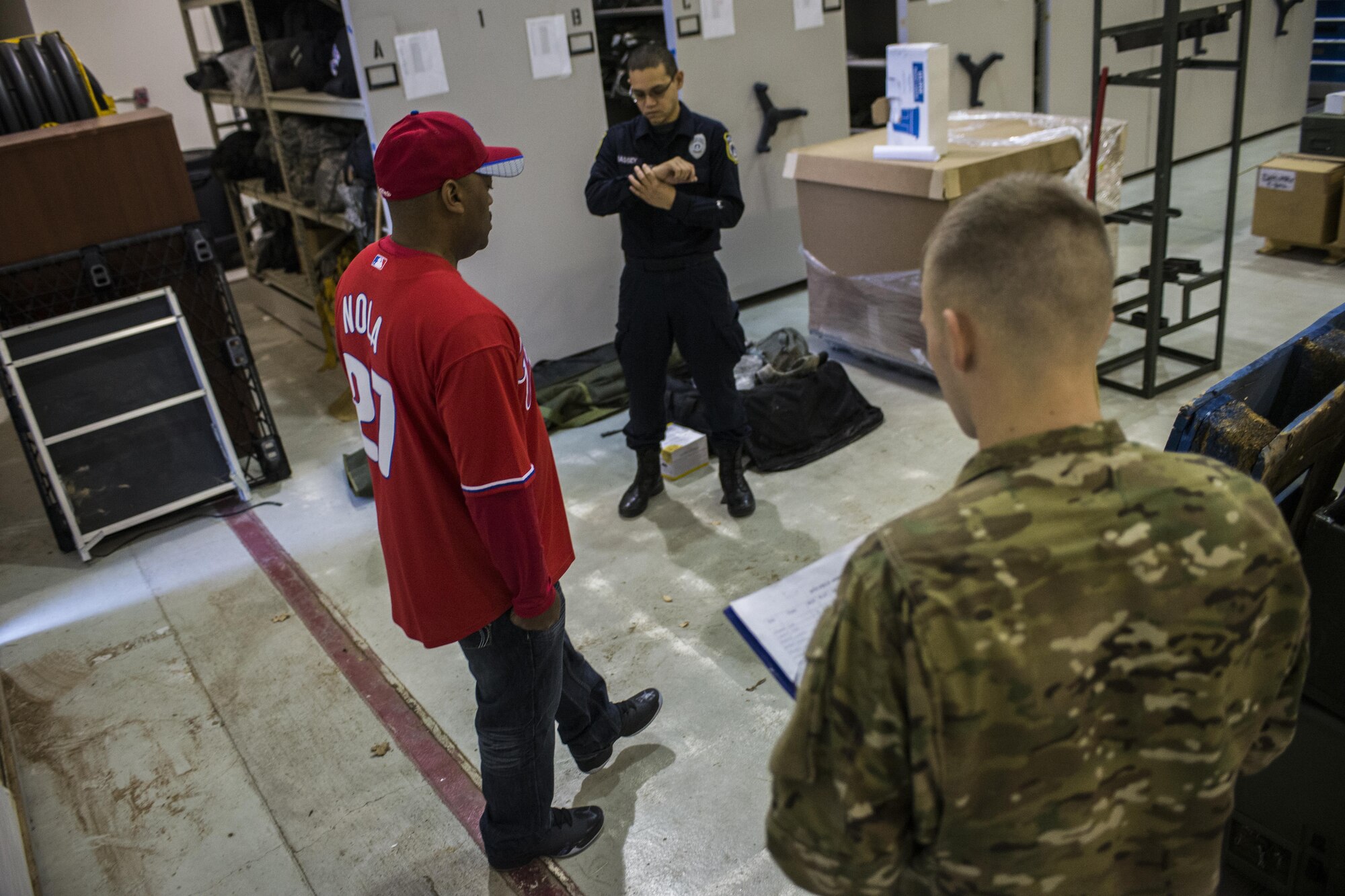 A participant, left, balances on one foot during Standardized Field Sobriety Test training for 27th Special Operations Security Forces Squadron members Jan. 25, 2017, at Cannon Air Force Base, N.M. The officers had the volunteers perform as series of tasks testing motor skills like balancing on one foot and walking in a straight line while simultaneously assessing their mental sharpness with concise counting and answering of questions. (U.S. Air Force photo by Senior Airman Luke Kitterman/Released)    