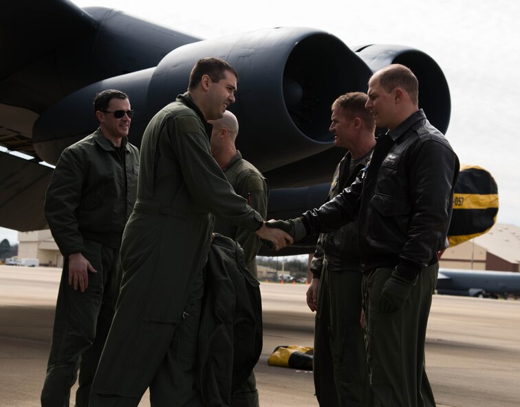 Drew Walter and Tim Morrison, House Armed Services Committee Professional Staff Members, thank U.S. Air Force pilots from the 93rd Bomb Squadron after returning from an incentive flight at Barksdale Air Force Base, La., Jan. 27, 2017.    The four hour flight allowed the staff members to see first-hand the mission capabilities of the jet and get feedback from aircrew about the future improvements to the more than 60 year old aircraft. (U.S. Air Force photo by Staff Sgt. Jason McCasland/Released)