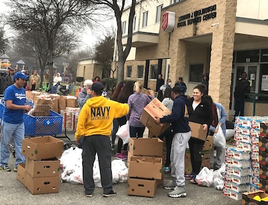 Recuiters assigned to Navy Recruiting District (NRD) San Antonio volunteered at the Salvation Army in support of the Feed the Hungry Volunteer Food Distribution program.  Recruiting America's best and brightest into naval service is not the only mission for recruiters of NRD San Antonio, but also giving back to the community in which they recruit.  (U.S. Navy Photo by NCC Owen Johnson, Navy Recruiting District San Antonio/Released)