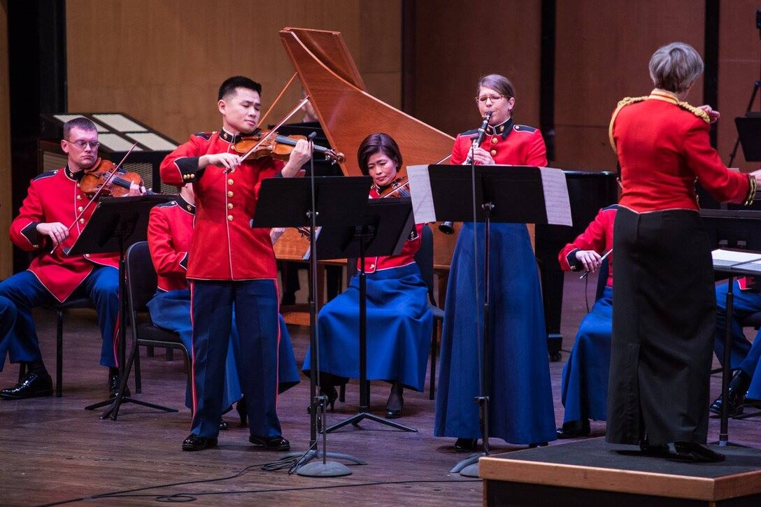 The Marine Chamber Orchestra performed the concert "Water Music" on Jan. 29 at Northern Virginia Community College's Schlesinger Concert Hall in Alexandria, Va., featuring two selections both titled "Water Music:" Suites Nos. 2 & 3 of Handel's Water Music and Ned Rorem's violin and clarinet duet. (U.S. Marine Corps photo by Gunnery Sgt. Brian Rust/released)