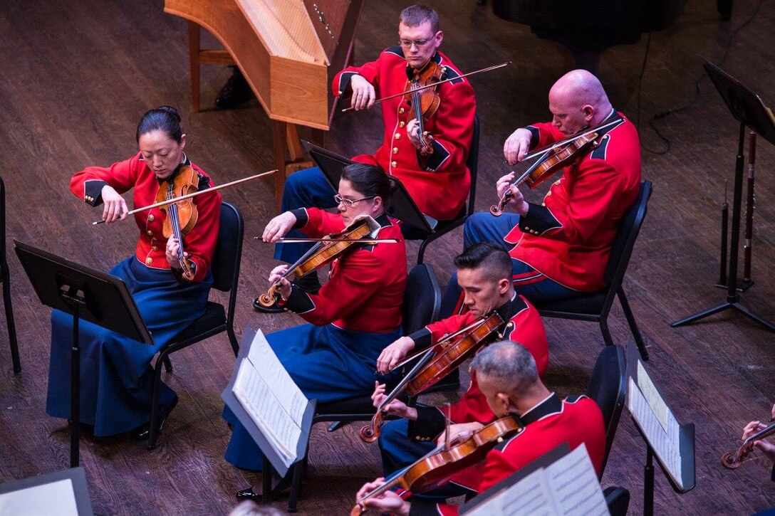The Marine Chamber Orchestra performed the concert "Water Music" on Jan. 29 at Northern Virginia Community College's Schlesinger Concert Hall in Alexandria, Va., featuring two selections both titled "Water Music:" Suites Nos. 2 & 3 of Handel's Water Music and Ned Rorem's violin and clarinet duet. (U.S. Marine Corps photo by Gunnery Sgt. Brian Rust/released)