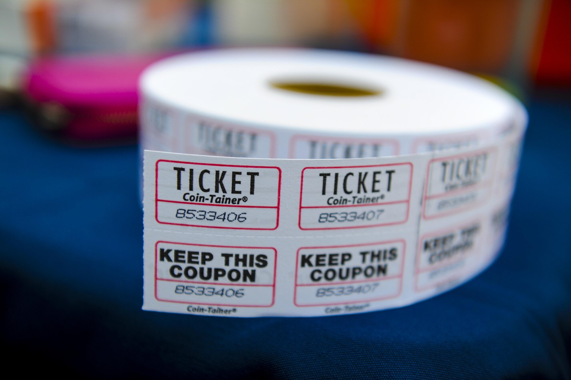 Raffle tickets are given out during the Heritage 5k and half marathon event for Air Commandos and their Families at Hurlburt Field, Fla., Jan. 28, 2017. The 1st Special Operations Force support Squadron raffled off gift certificates to a running store. (U.S. Air Force photo by Airman Dennis Spain)