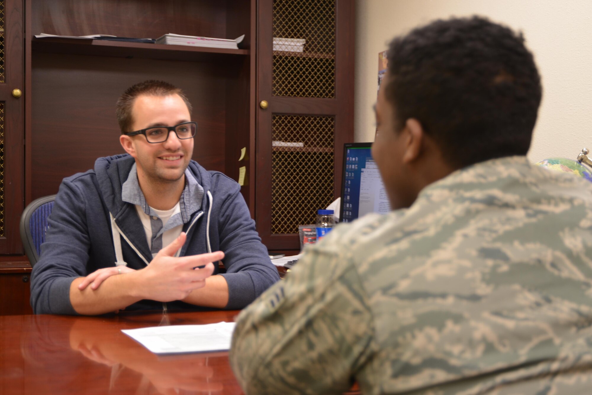 The tax center, operated entirely by volunteers, prepared 1,411 federal and state tax returns last year, saving clients roughly $136,000 in preparation and filing costs.  The volunteers received five days of volunteer income tax assistance training and have varying degrees of experience with tax filing. (U.S. Air Force photo by Senior Airman Chandler Baker)