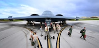 U.S. Air Force maintenance technicians assigned to the 509th Aircraft Maintenance Squadron, Whiteman Air Force Base, Mo., prepare a U.S. Air Force B-2 Spirit aircraft to be towed after a local training mission at Anderson Air Force Base, Guam Jan. 19, 2017. Close to 200 Airmen from Whiteman Air Force Base, Mo., and Barksdale Air Force Base, La., deployed to Andersen AFB, in support of U.S. Strategic Command Bomber Assurance and Deterrence missions. USSTRATCOM bomber missions familiarize aircrew with airbases and operations in different Geographic Combatant Commands. (U.S. Air Force photo by Tech. Sgt. Andy M. Kin) Click image for story.