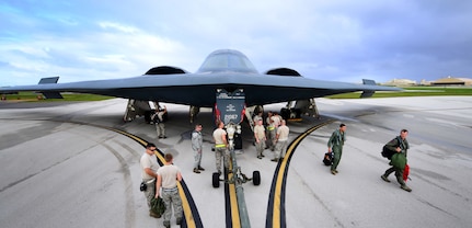 U.S. Air Force maintenance technicians assigned to the 509th Aircraft Maintenance Squadron, Whiteman Air Force Base, Mo., prepare a U.S. Air Force B-2 Spirit aircraft to be towed after a local training mission at Anderson Air Force Base, Guam Jan. 19, 2017. Close to 200 Airmen from Whiteman Air Force Base, Mo., and Barksdale Air Force Base, La., deployed to Andersen AFB, in support of U.S. Strategic Command Bomber Assurance and Deterrence missions. USSTRATCOM bomber missions familiarize aircrew with airbases and operations in different Geographic Combatant Commands. (U.S. Air Force photo by Tech. Sgt. Andy M. Kin) Click image for story.