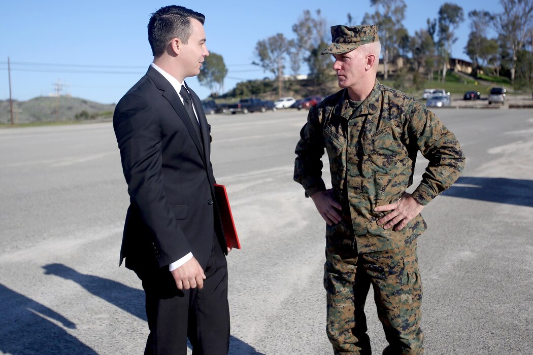 Sgt. Zachary L. Piepenhagen (left), talks to Sgt. Maj. Bradley Kasal, sergeant major, I Marine Expeditionary Force, after being awarded the Navy and Marine Corps Medal, at Marine Corps Base Camp Pendleton, Calif., Jan. 26, 2017. Piepenhagen was awarded the medal for saving the life of a distressed Sailor who climbed over the guard rail in an attempt to commit suicide while serving with the 13th Marine Expeditionary Unit. (U.S. Marine Corps photo by Private First Class Gabino Perez)