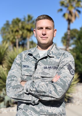 Staff Sgt. Devin Smith is a U.S. Air Force Reserve command post controller assigned to Davis-Monthan Air Force Base, Ariz. He responded to the scene of an accident in downtown Tucson Jan. 19, assisting a 16-year-old girl whose truck rolled over and could have caught on fire. She was released from the hospital, having suffered no major injuries. (U.S. Air Force photo by Carolyn Herrick)