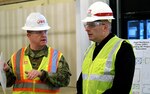 U.S. Army North Command Force Health Protection Officer Col. James Flanagan Jr. (left) discusses the Vogel Resiliency Center project with Brooke Army Medical Center Commander Brig. Gen. Jeffrey Johnson. The renovation of building 367 is on schedule for a January 2018 grand opening of the Vogel Resiliency Center, in conjunction with San Antonio's tricentennial celebration of the Alamo City's 300th birthday. The Vogel Resiliency Center will provide services in support of the service members, retirees, civilians and military families in ready and resilient healthy lifestyles to enable them to achieve and sustain optimal personal readiness. U.S. Army photo by Tim Hipps, Army North Public Affairs
