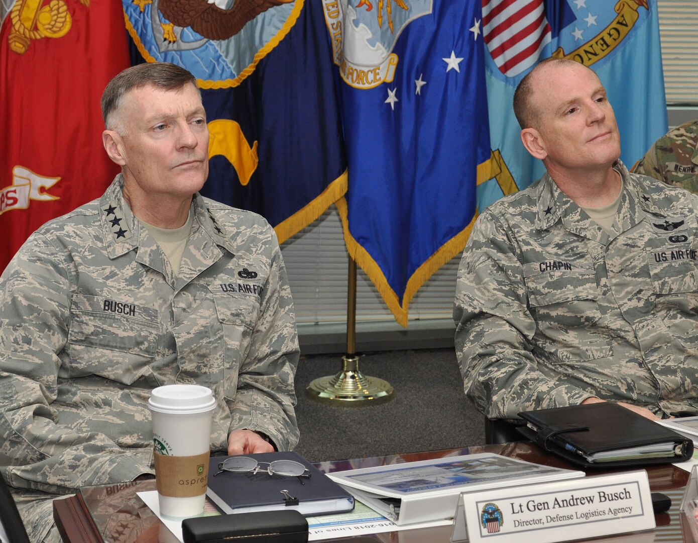 Defense Logistics Agency Director Air Force Lt. Gen. Andy Busch and DLA Energy Commander Air Force Brig. Gen. Martin Chapin listen to a briefing during the DLA Energy's Annual Operating Plan Review at the McNamara Headquarters Complex, Fort Belvoir, Jan. 30. 