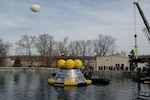 Naval Surface Warfare Center, Carderock Division engineers, along with a NASA test and evaluation team conducted initial post-landing Orion Recovery Test operations, March 23-27, 2009, of a full-scale model of NASA’s Orion space capsule at Carderock’s pentagon-shaped test pond in West Bethesda, Md. The Orion model will be on display in Houston during the week leading up to Super Bowl LI. (U.S. Navy photo by Ryan Hanyok/Released)