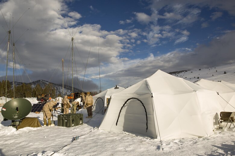 Marines with 2nd Battalion, 2nd Marine Regiment, set up communication equipment in a tent city located in the Grouse Meadows training area during Mountain Training Exercise 1-17 in the vicinity of the Marine Corps Mountain Warfare Training Center Bridgeport, Calif., Jan, 18, 2016. MCMWTC is one of the Marine Corps’ most secluded posts, comprised of approximately 46,000 acres of terrain with elevations ranging from 5,000 to 11,000 feet. During this iteration of MTX, the inclusion of the Artic Tent, designed to house up to 15 personnel, enabled the “Warlords” to be truly immersed in the frigid landscape throughout the full duration of the training. (U.S. Marine Corps photo by Cpl. Levi Schultz)