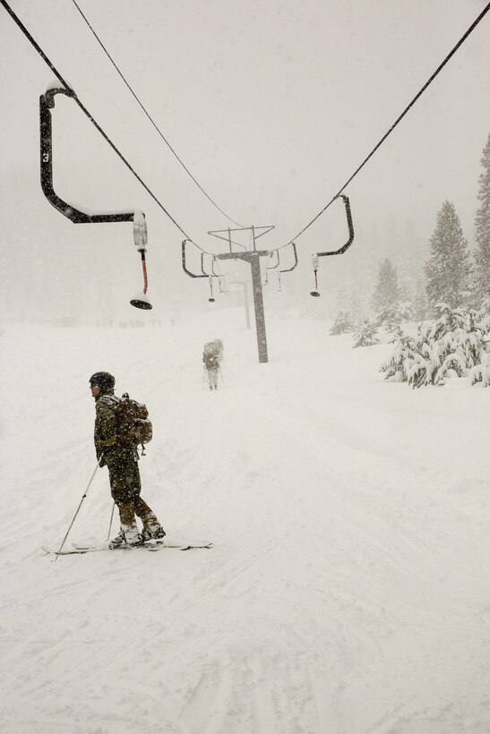 Cpl. Austin Smith, rifleman, 2nd Battalion, 2nd Marine Regiment, rests at the bottom of a ski lift while conducting ski drills during Mountain Training Exercise 1-17 in the Marine Corps Mountain Warfare Training Center Bridgeport, Calif., training area Jan. 19, 2016. MCMWTC is one of the Marine Corps’ most secluded posts, comprised of approximately 46,000 acres of terrain with elevations ranging from 5,000 to 11,000 feet. The exercise trains elements of the Marine air-ground task force across the warfighting functions for operations in mountainous, high-altitude and cold-weather environments in order to enhance a unit’s ability to shoot, move, communicate, sustain and survive in the most rugged regions of the world. (U.S. Marine Corps photo by Cpl. Levi Schultz)