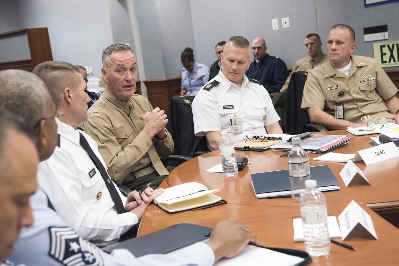 Marine Corps Gen. Joe Dunford, chairman of the Joint Chiefs of Staff, speaks with Army Command Sgt. Maj. John Troxell, the senior enlisted advisor to the chairman, and senior enlisted leaders from across the Defense Department during the Defense Senior Enlisted Leaders Council at the Pentagon, Dec. 1, 2016. DoD photo by Navy Petty Officer 2nd Class Dominique A. Pineiro