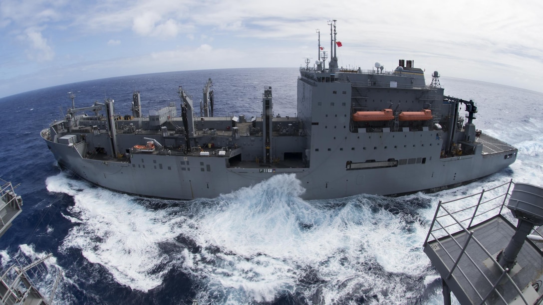 The Military Sealift Command dry cargo and ammunition ship USNS Charles Drew steams alongside the aircraft carrier USS Carl Vinson during a replenishment in the Pacific Ocean, Jan. 28, 2017. Navy photo by Petty Officer 3rd Class Theo Shively