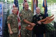 Gen. Robert B. Brown (center), commanding officer, U.S. Army Pacific, and Sgt. Maj. Christopher S. Richardson (left), Command Career Counselor, USARPAC, presents Sgt. 1st Class Chad Emrick, a U.S. Army Reserve Component Career Counselor, the USARPAC Reserve Component Career Counselor of the Year award. Emrick earned the award during USARPAC's annual career counselor competition that consists of the Army physical fitness test, written exam, and a board appearance. 