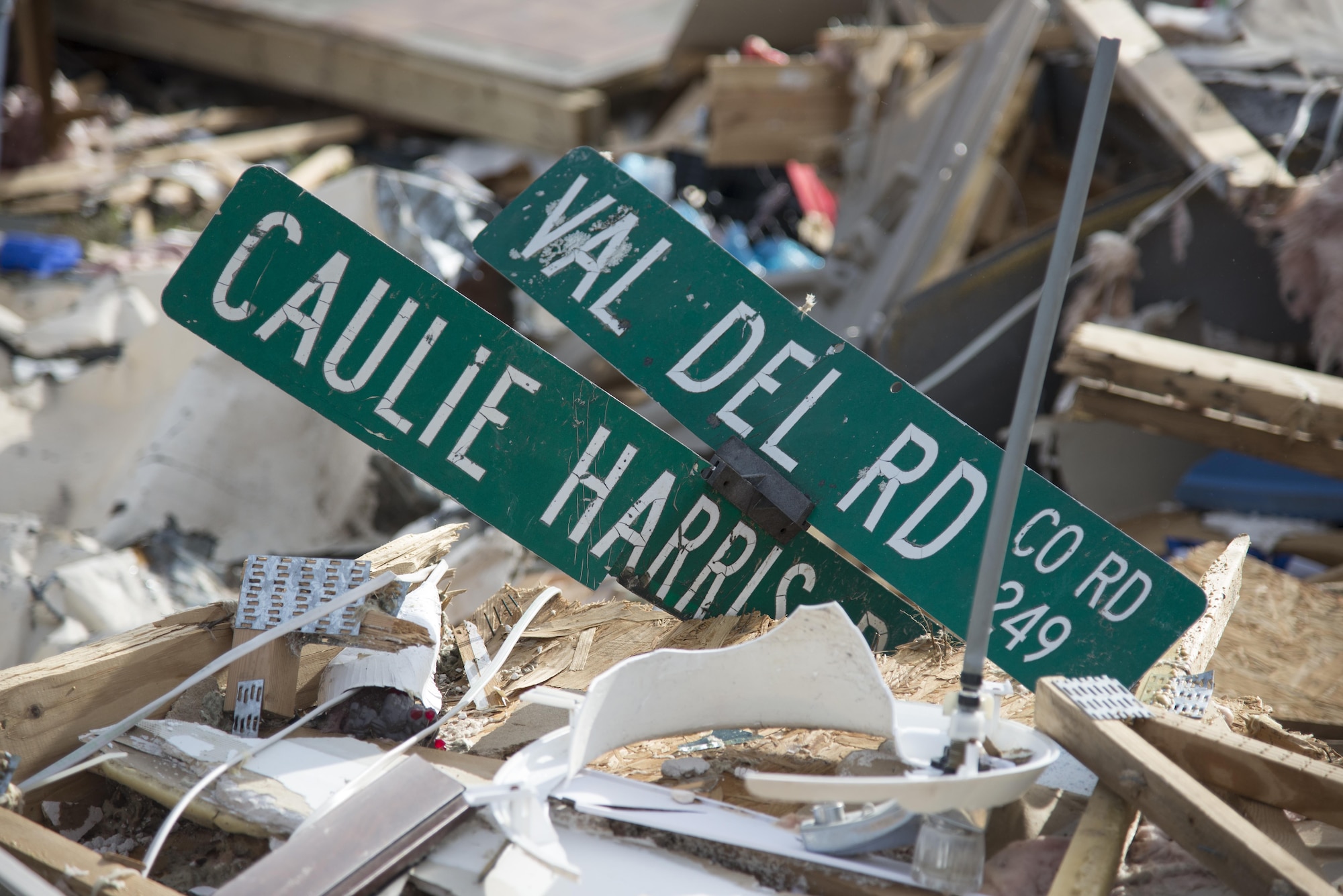 A road sign lays amongst the remains of the homes destroyed by a tornado, Jan. 28, 2017, in Adel, Ga. The tornado killed 15 people and was later deemed an EF3, the strongest tornado to touch down in the county’s history. (U.S. Air Force photo by 2d Lt. Kaitlin Toner)