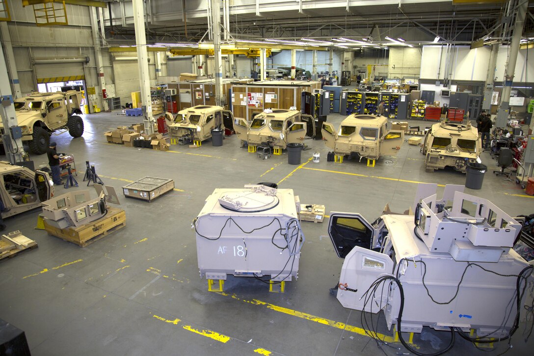 Crew capsules of several Mine Resistant Ambush Protected All Terrain Vehicles, or M-ATV, sit awaiting repair and upgrade at Production Plant Barstow, Marine Depot Maintenance Command, on the Yermo Annex of Marine Corps Logistics Base Barstow. The artisans working the M-ATV line are refurbishing the 17-ton vehicles for both the U.S. Air Force and Marine Corps for future use. 