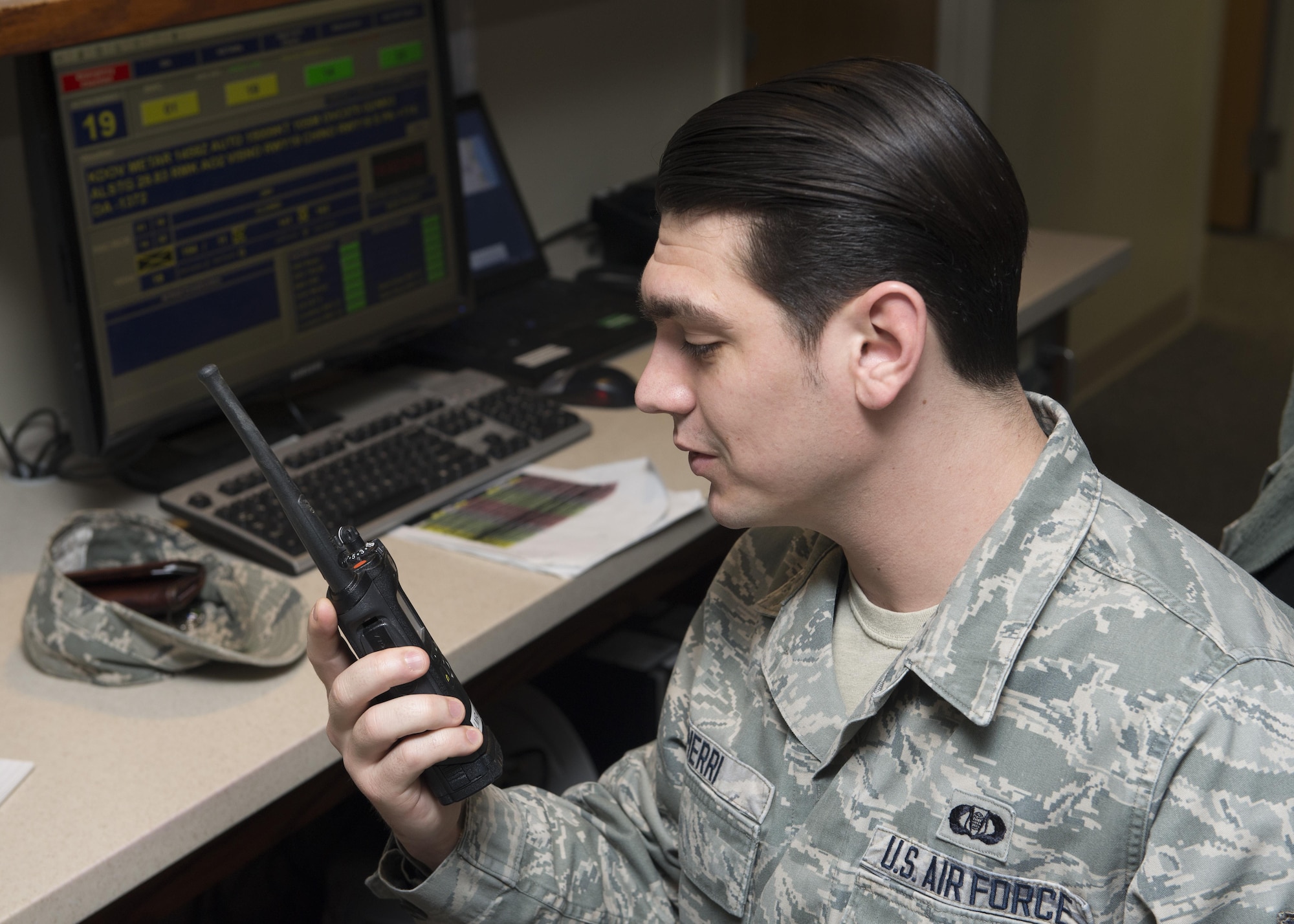 Senior Airman Derek Pierri, 436th Operations Support Squadron airfield management, uses a trunked land mobile radio to communicate with other base personnel Jan. 31, 2017, on Dover Air Force Base, Del. This radio system, used by units across the base, was recently upgraded by the 436th Communications Squadron. (U.S. Air Force photo by Senior Airman Zachary Cacicia)