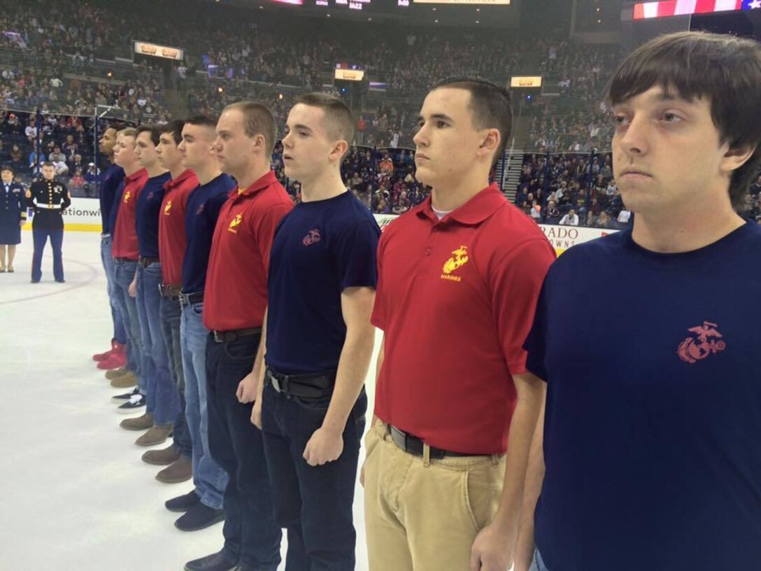 U.S. Marine Corps Poolees with Marine Corps Recruiting Sub-Stations North and South Columbus stand on the ice during an Oath of Enlistment ceremony at the Columbus Blue Jackets game Jan. 21, 2017. The Oath of Enlistment pledge is made by each enlisted member of the Armed Forces. This is the final step before basic training and confirms their duty to defend the constitution and obey orders given by officers appointed over them.  (U.S. Marine Corps photo by Sgt. Caitlin Brink/Released)