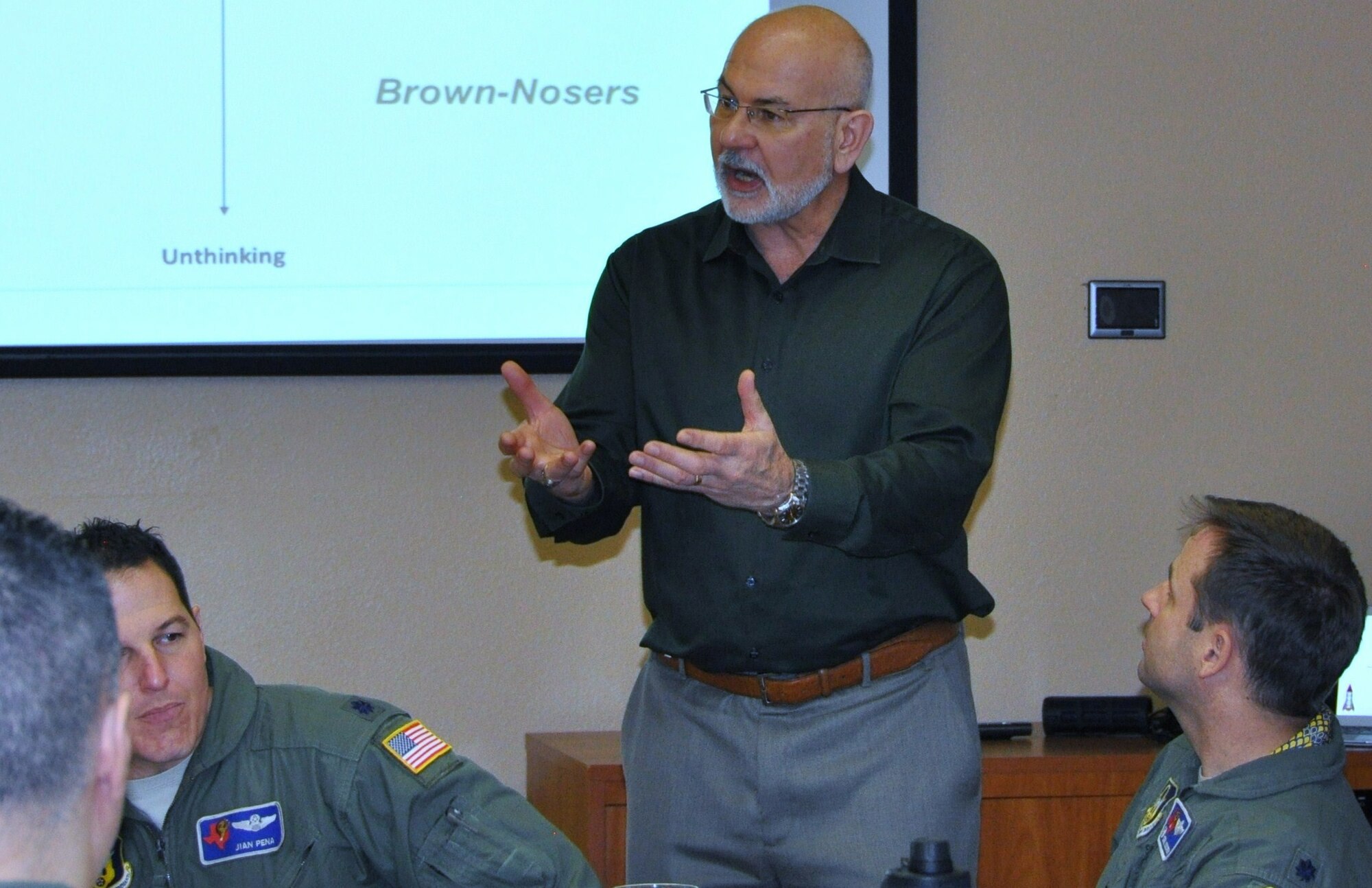 Dr. Gordon Curphy, leadership expert, briefs 39th Flying Training Squadron leadership at the JBSA-Randolph Parr Officer’s Club, Jan. 18, during a forum that took an in-depth look into squadron mission and leadership practices in the 39th FTS. (Photo by Janis El Shabazz)