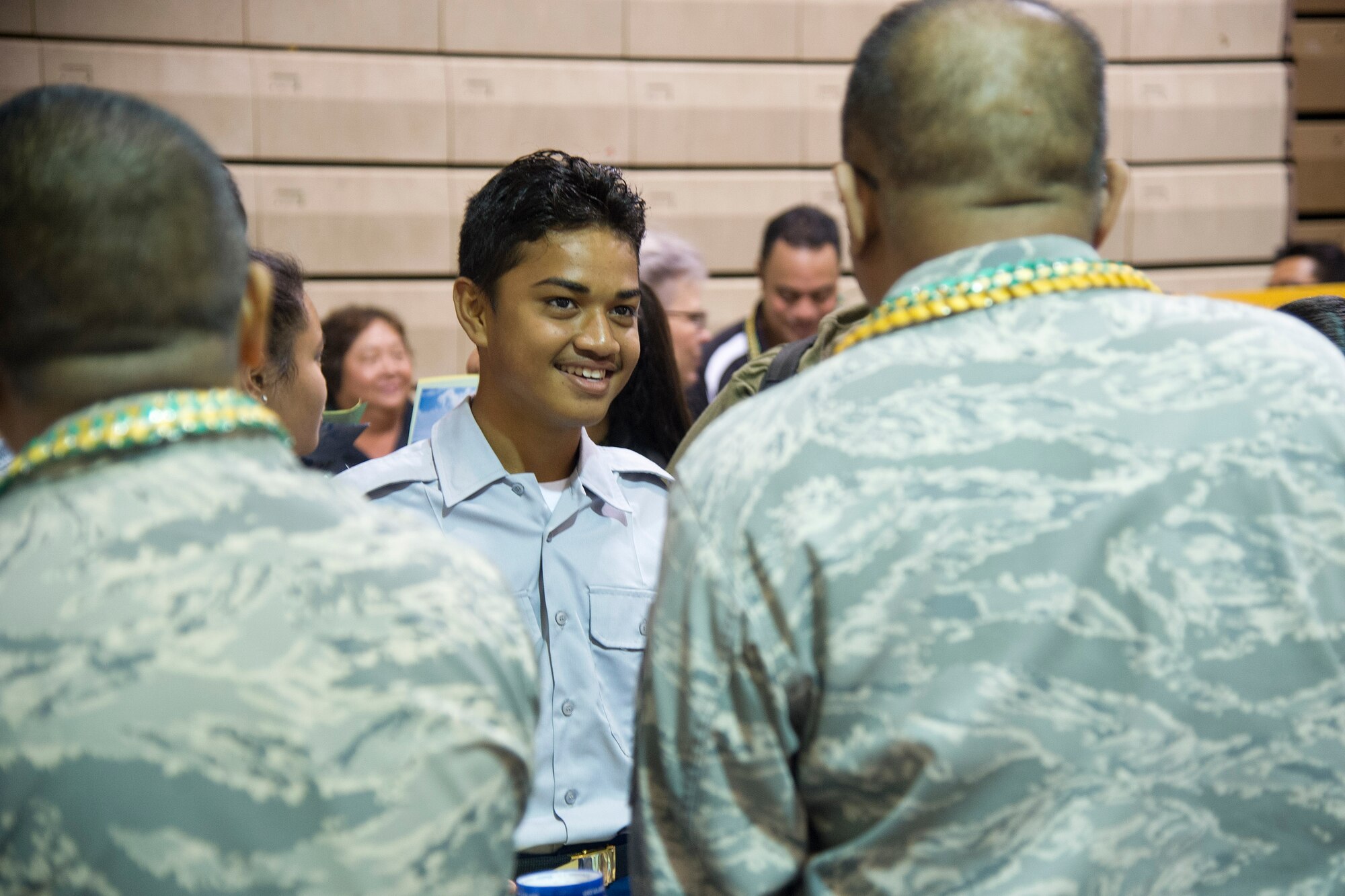 A high school student learns more about the Air Force Reserve during the school’s career fair at Kaimuki High School, Honolulu, Hawaii, Jan. 27, 2017. Eleven Airmen from the 624th Regional Support Group volunteered alongside the local recruiting station in support of the fair, which provided career guidance to more than 800 Hawaii students. Located on Oahu and Guam, and a component of the Air Force Reserve, the 624th Regional Support Group's mission is to deliver mission essential capability through combat readiness, quality management and peacetime deployments in the Pacific area of responsibility. (U.S. Air Force photo by Master Sgt. Theanne Herrmann)