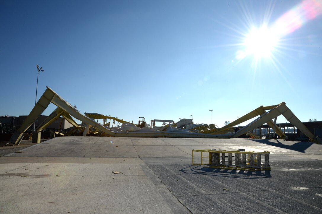 A heavy equipment-unloading ramp aboard Marine Corps Logistics Base Albany collapses after a tornado struck the installation, Jan. 22. A line of strong thunderstorms produced a tornado that passed through the Albany, Georgia, community and Marine Corps Logistics Base Albany carving a path of destruction leaving the landscape strewn with broken trees, downed power lines and damaged structures.
