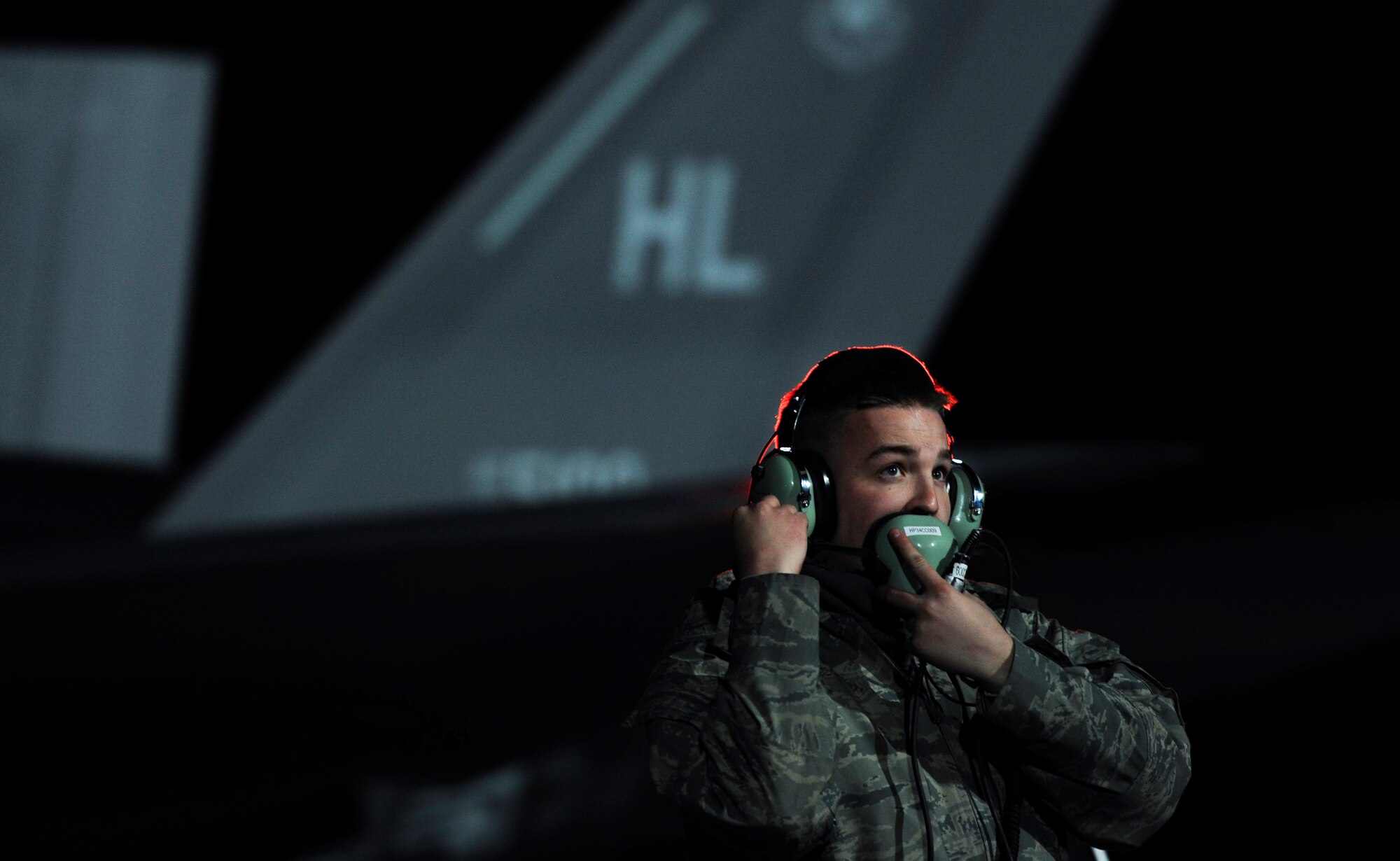 A crew chief assigned to the 388th Fighter Wing, Hill Air Force Base, Utah, speaks with the pilot of an F-35A Lightning II before take-off during Red Flag 17-1 on Nellis Air Force Base, Nev., Jan. 24, 2017. The mock battle training in the skies over the Nevada Test and Training Range has yielded results that increase the combat capability of U.S. and allied air forces for potential combat situations. (U.S. Air Force photo by Airman 1st Class Kevin Tanenbaum/Released)