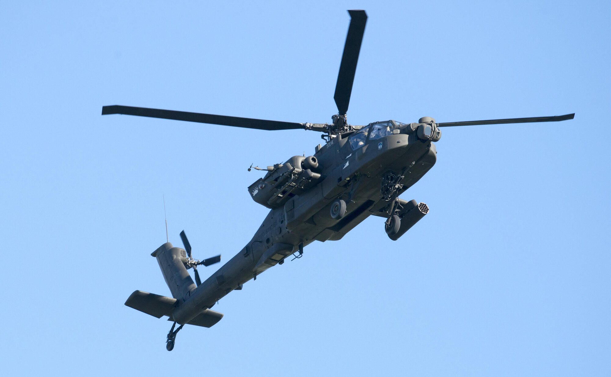 An AH-64 Apache attack helicopter conducts flight operations at Travis Air Force Base, Calif., Jan, 6, 2017. This aircraft is the U. S. Army’s heavy division/corps attack helicopter.  The AH-64 Apache is a four-blade attack helicopter with reverse-tricycle landing gear, and features a tandem cockpit for a crew of two. (U.S. Air Force photo/Heide Couch)