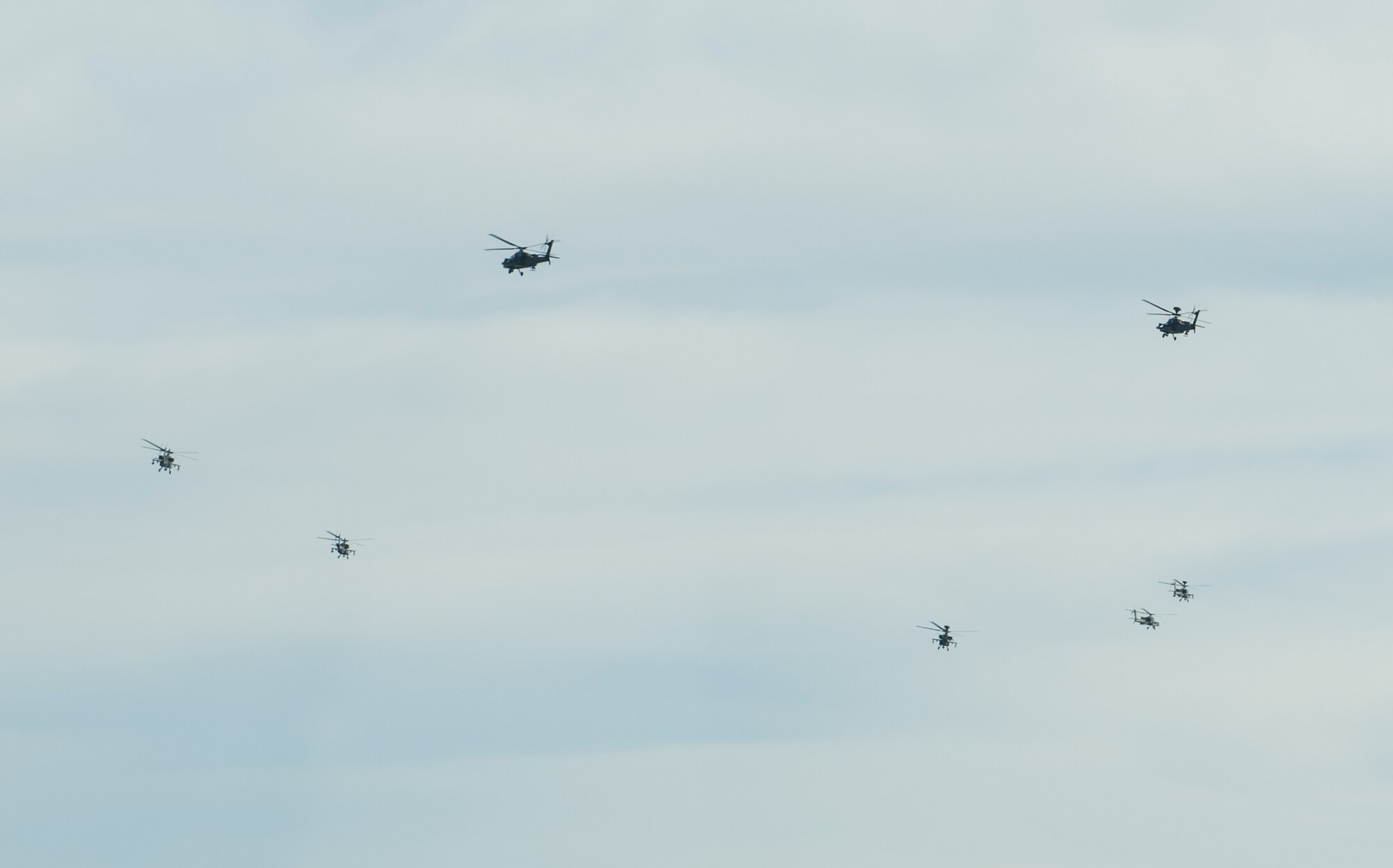 AH-64 Apache attack helicopters conduct flight operations at Travis Air Force Base, Calif., Jan, 6, 2017. This aircraft is the U. S. Army’s heavy division/corps attack helicopter. The AH-64 Apache is a four-blade attack helicopter with reverse-tricycle landing gear and features a tandem cockpit for a crew of two. (U.S. Air Force photo/Heide Couch)