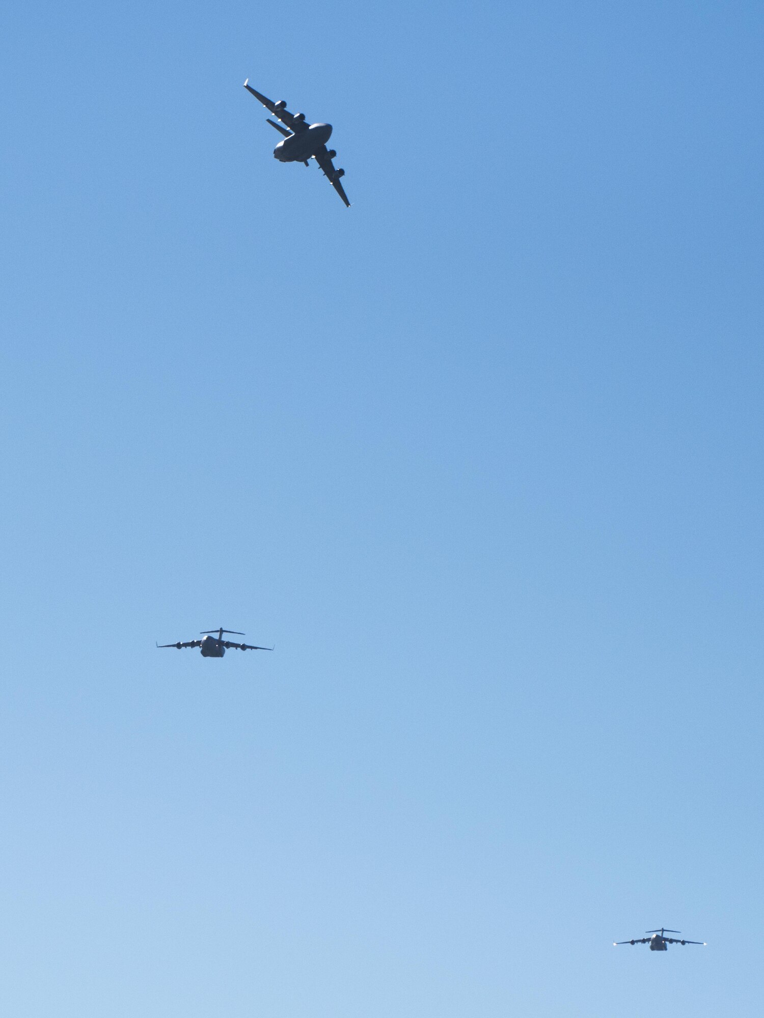 C-17 Globemaster III aircraft from Joint Base Charleston, South Carolina conduct flight operations at Travis Air Force Base, Calif., Jan, 13, 2017. This military airlift aircraft is a high-wing, four-engine, T-tailed military transport vehicle capable of carrying payloads up to 169,000 pounds. It has an international range and the ability to land on small airfields. A fully integrated electronic cockpit and advanced cargo system allows a crew of three to operate all systems on any type of mission. (U.S. Air Force photo/Heide Couch)