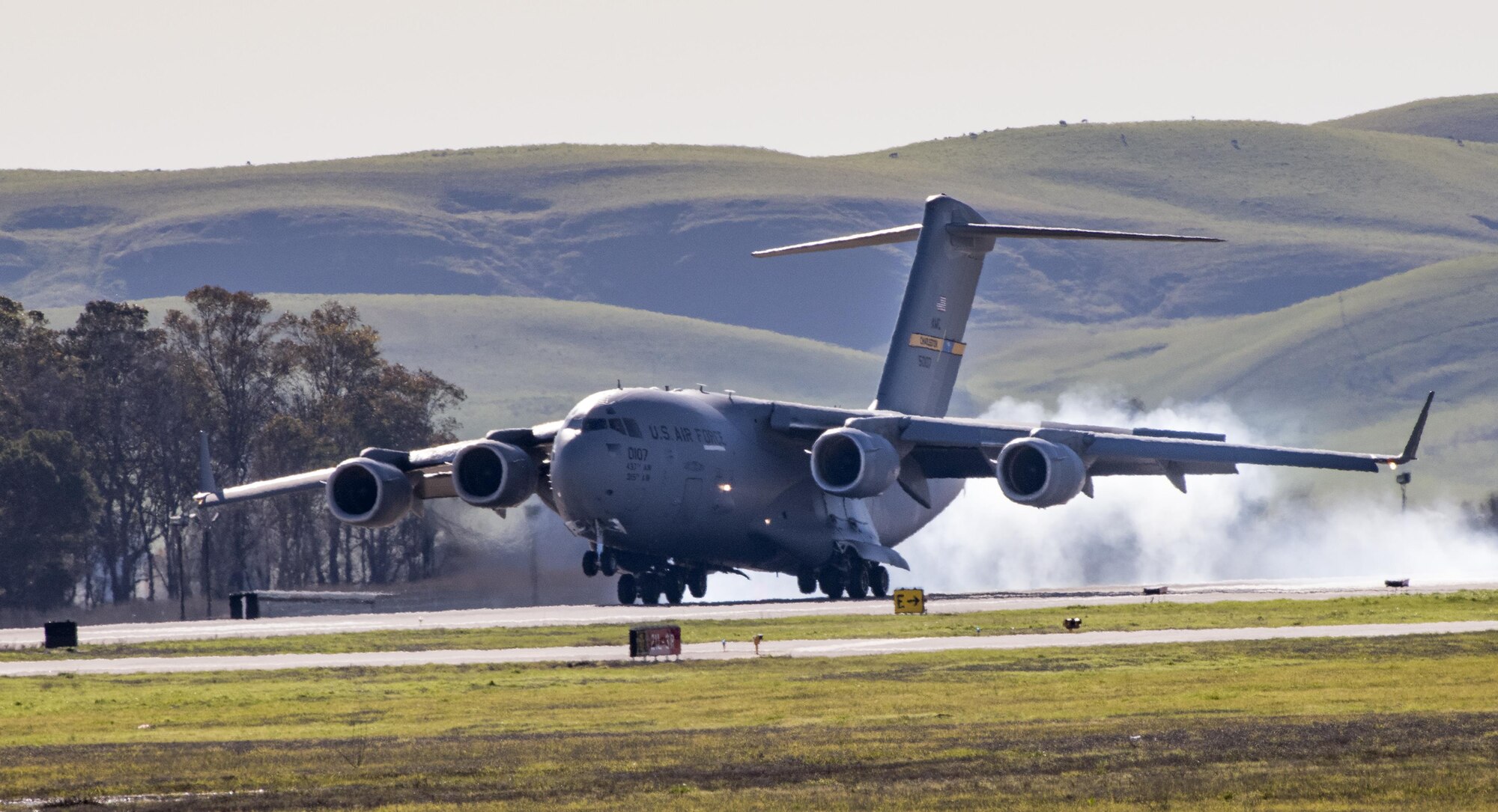 A C-17 Globemaster III from Joint Base Charleston, South Carolina conducts flight operations at Travis Air Force Base, Calif., Jan, 13, 2017. This military airlift aircraft is a high-wing, four-engine, T-tailed military transport vehicle capable of carrying payloads up to 169,000 pounds. It has an international range and the ability to land on small airfields. A fully integrated electronic cockpit and advanced cargo system allows a crew of three to operate all systems on any type of mission. (U.S. Air Force photo/Heide Couch)