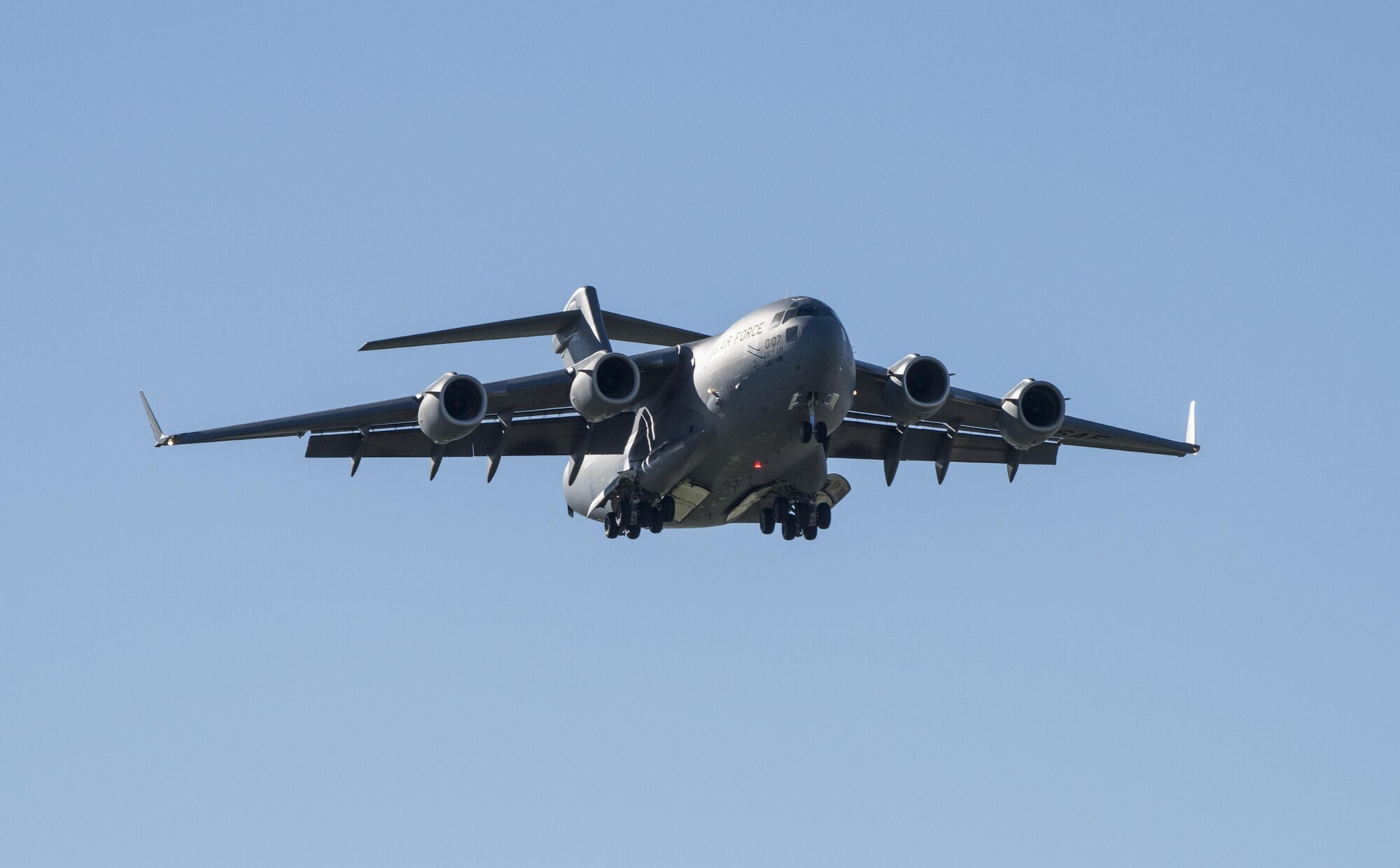 A C-17 Globemaster III aircraft from Joint Base Charleston, South Carolina conducts flight operations at Travis Air Force Base, Calif., Jan, 13, 2017. This military airlift aircraft is a high-wing, four-engine, T-tailed military transport vehicle capable of carrying payloads up to 169,000 pounds. It has an international range and the ability to land on small airfields. A fully integrated electronic cockpit and advanced cargo system allows a crew of three to operate all systems on any type of mission. (U.S. Air Force photo/Heide Couch)