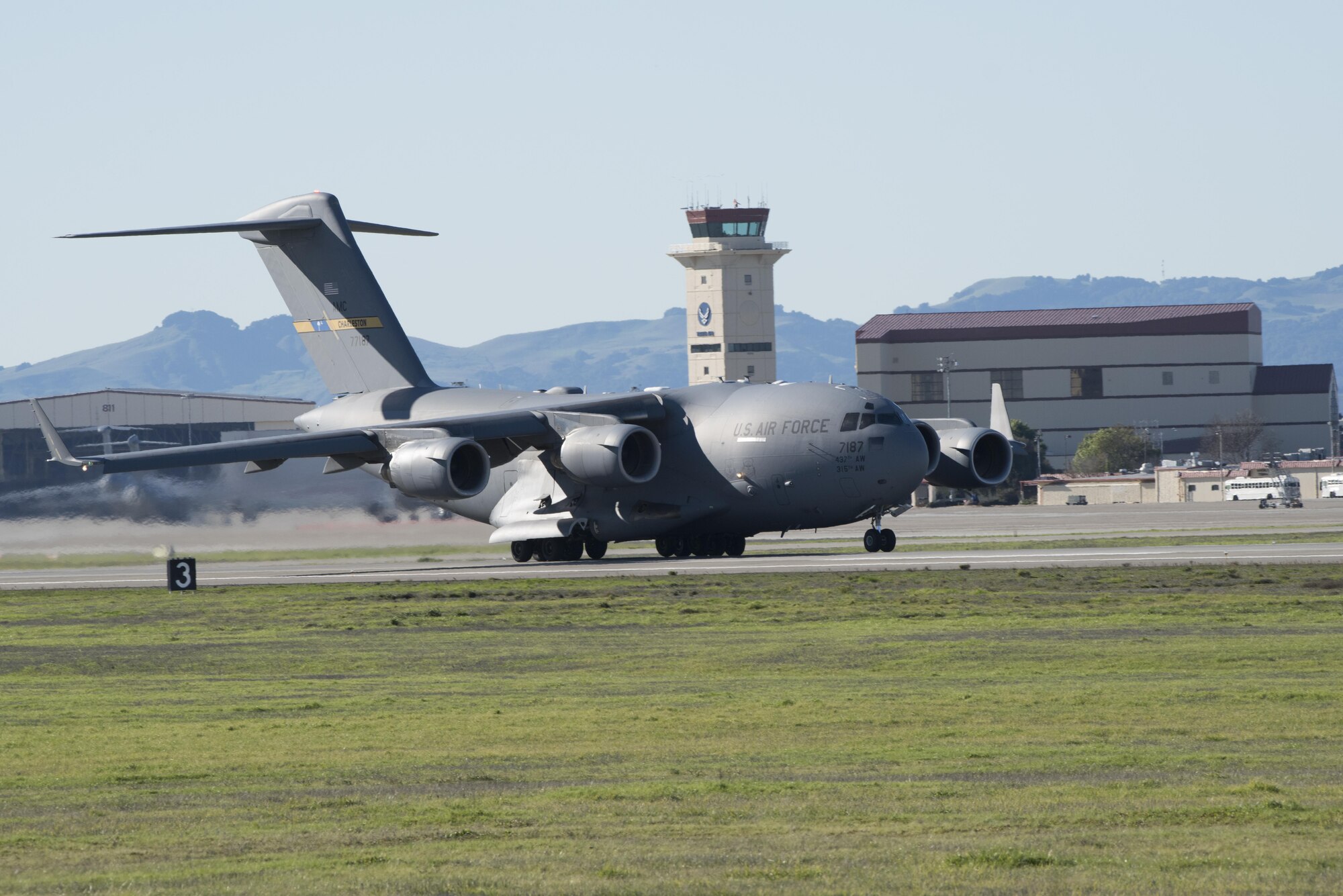 A C-17 Globemaster III from Joint Base Charleston, South Carolina conducts flight operations at Travis Air Force Base, Calif., Jan, 13, 2017. This military airlift aircraft is a high-wing, four-engine, T-tailed military transport vehicle capable of carrying payloads up to 169,000 pounds. It has an international range and the ability to land on small airfields. A fully integrated electronic cockpit and advanced cargo system allows a crew of three to operate all systems on any type of mission. (U.S. Air Force photo/Heide Couch)