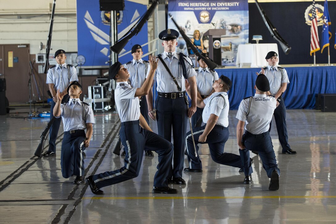 Members of the John Jay High School drill team perform during Air Education and Training Command's 75th Anniversary Extravaganza at Joint Base San Antonio-Randolph, Texas,  Jan. 23, 2017. The event celebrated the command's history of transforming civilians into airmen and its contribution to the future success of the Air Force. Air Force photo by Senior Airman Stormy Archer