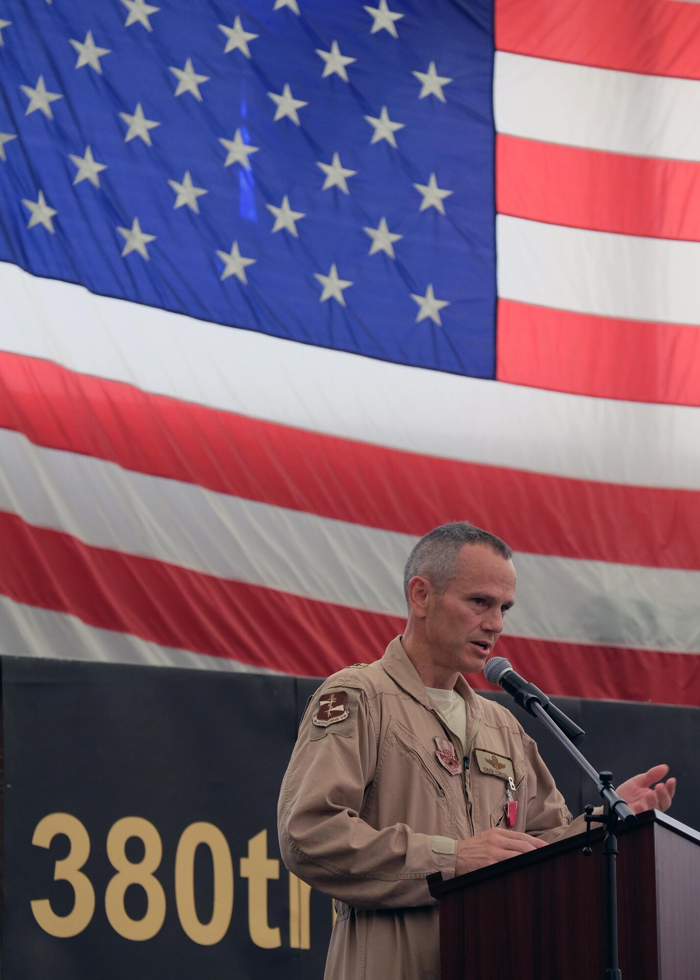 Brig. Gen. Charles S. Corcoran, outgoing 380th Air Expeditionary commander, speaks to Airmen during a change of command ceremony July 1, 2017, at an undisclosed location in southwest Asia. Corcoran — a command pilot with more than 3,000 flying hours — is slated to assume Deputy Chief of Staff for NATO Air Operations at Ramstein, Germany, at Allied Air Command Headquarters, Ramstein, Germany. (U.S. Air Force photo by Senior Airman Preston Webb)