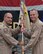 From right, Brig. Gen. Derek C. France, incoming 380th Air Expeditionary commander, receives the 380 AEW guidon from Lt. Gen. Jeffrey L. Harrigian, U.S. Air Forces Central Command commander, during a change of command ceremony July 1, 2017, at an undisclosed location in southwest Asia. The passing of the guidon signifies transfer of authority from one commander to the next. (U.S. Air Force photo by Senior Airman Preston Webb)