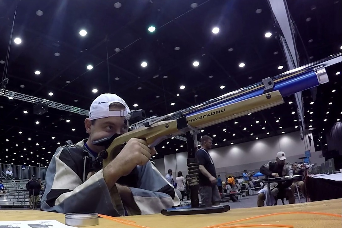 Jonathan Lemoine fires an air rifle during practice sessions for the 2017 Department of Defense Warrior Games. Lemoine joined the Air Force in 2014 as a firefighter. He was injured while swimming in a lake, ending his career with a spinal cord injury. He continues to represent the U.S Air Force as an athlete at the 2017 DoD Warrior Games in Chicago.