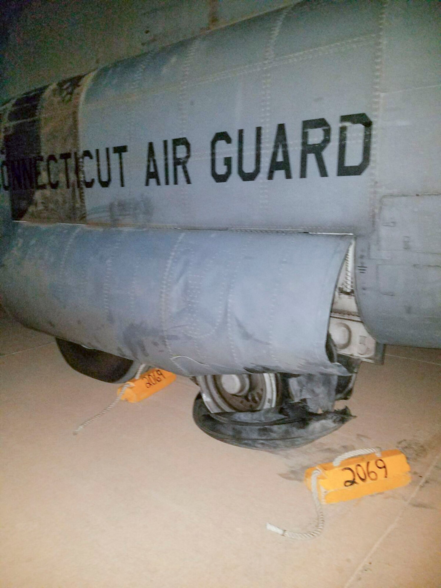 A 386th Air Expeditionary Wing C-130H Hercules sits immobile after experiencing a tire blowout on landing at an undisclosed location in Southwest Asia, June 16, 2017. (U.S. Air Force photo by Master Sgt. Eric M. Sharman)