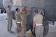 The 386th Expeditionary Maintenance Squadron combat metals team installs a repaired C-130H landing gear door during a maintenance operation at an undisclosed location in Southwest Asia, June 23, 2017. (U.S. Air Force photo by Master Sgt. Eric M. Sharman)