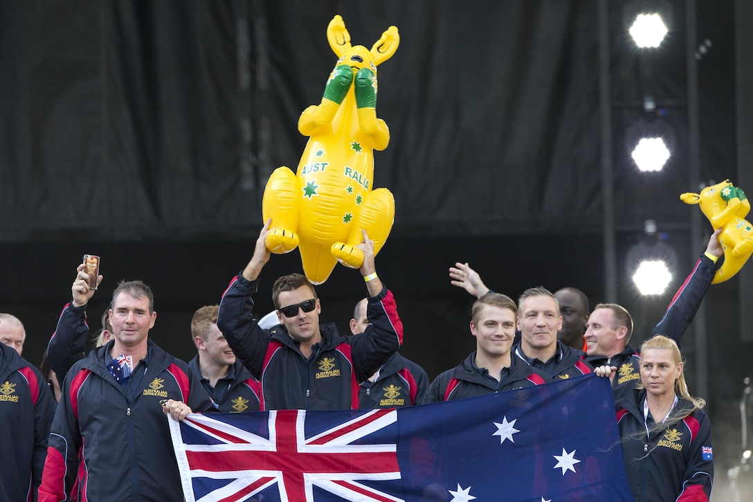 Team Australia carries an inflatable kangaroo as they enter the 2017 Department of Defense Warrior Games opening ceremony at Soldier Field in Chicago, July 1, 2017. The DoD Warrior Games are an annual event allowing wounded, ill and injured service members and veterans to compete in Paralympic-style sports. DoD photo by EJ Hersom