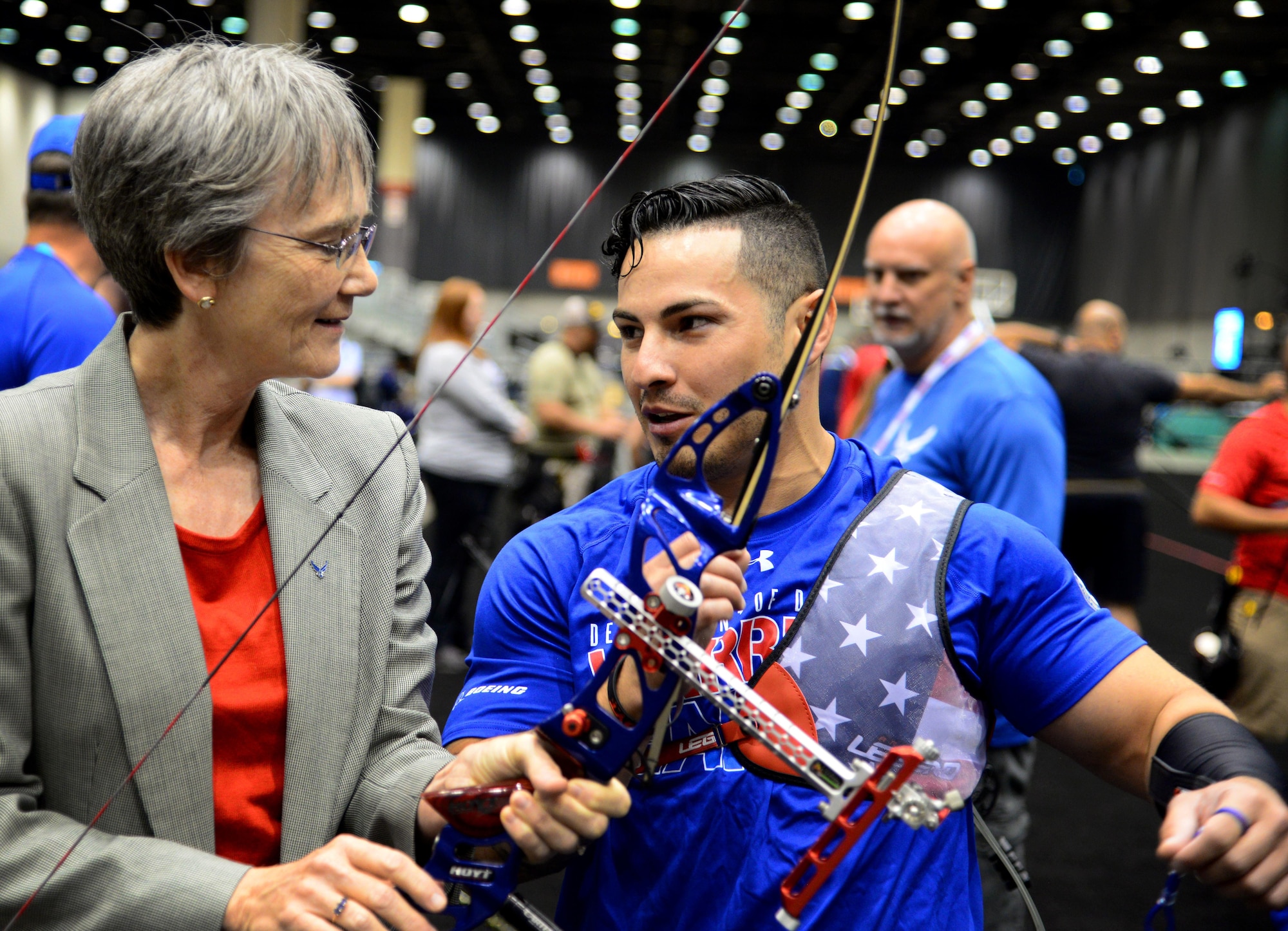 Secretary of the Air Force Heather Wilson speaks with Staff Sgt. Vincent Cavazos, a security forces troop from Fresno, Calif., during a meet-and-greet with archery team athletes at the 2017 Warrior Games July 1, 2017 at McCormick Place-Lakeside Center in Chicago. Cavazos provided Wilson with details surrounding the sporting event as well as bow handling techniques. (U.S. Air Force photo/Staff Sgt. Alexx Pons)
