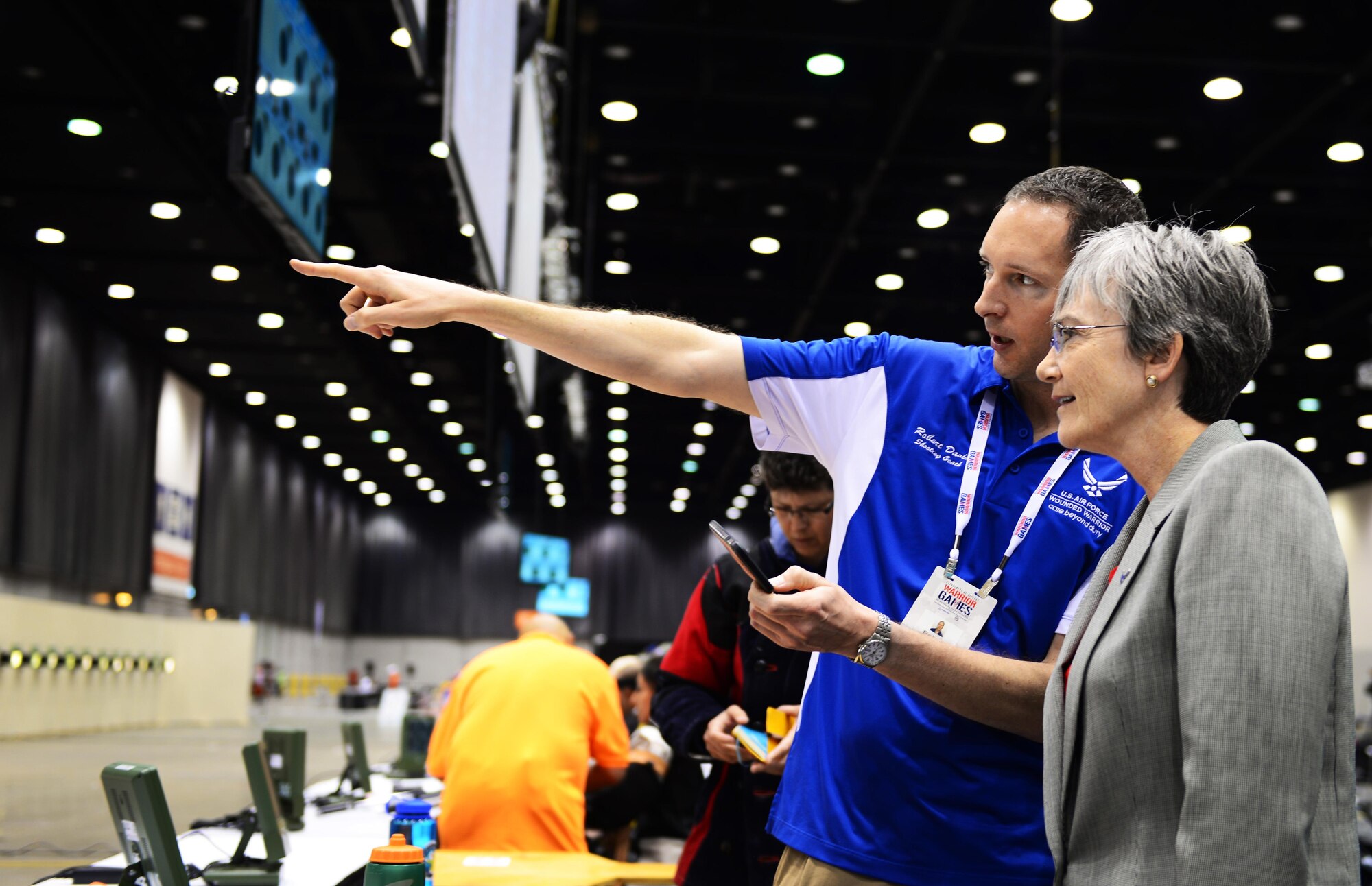 Secretary of the Air Force Heather Wilson gets a behind-the-scenes view of how the shooting events take place from Team Air Force’s shooting coach Robert Davis at the 2017 Warrior Games July 1, 2017 at McCormick Place-Lakeside Center in Chicago. Approximately 250 seriously wounded, ill and injured service members and veterans will participate in this year’s competition representing the Army, Marine Corps, Navy, Coast Guard, Air Force and Special Operations Command. (U.S. Air Force photo/Staff Sgt. Chip Pons)