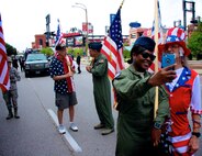 The 932nd Airlift Wing Public Affairs Shop coordinated participation in the July 1, 2017 Saint Louis VP parade, to recognize America's birthday.  From left, waiting to start the parade are Senior Airman Maria Tremblay, retired non-commissioned officer in charge of PA, Tech Sgt. Daniel Oliver; 932nd Operations Group commander Col. Ray Smith, and Master Sgt.  Monica Codner.  She was seen here catching a photo with "Uncle Sam" who is a 24 year Air Force veteran and he expressed heartfelt wishes to not only the 932nd Airlift Wing but to all of the men and women currently serving in the armed forces.  (U.S. Air Force photo by Lt. Col. Stan Paregien)