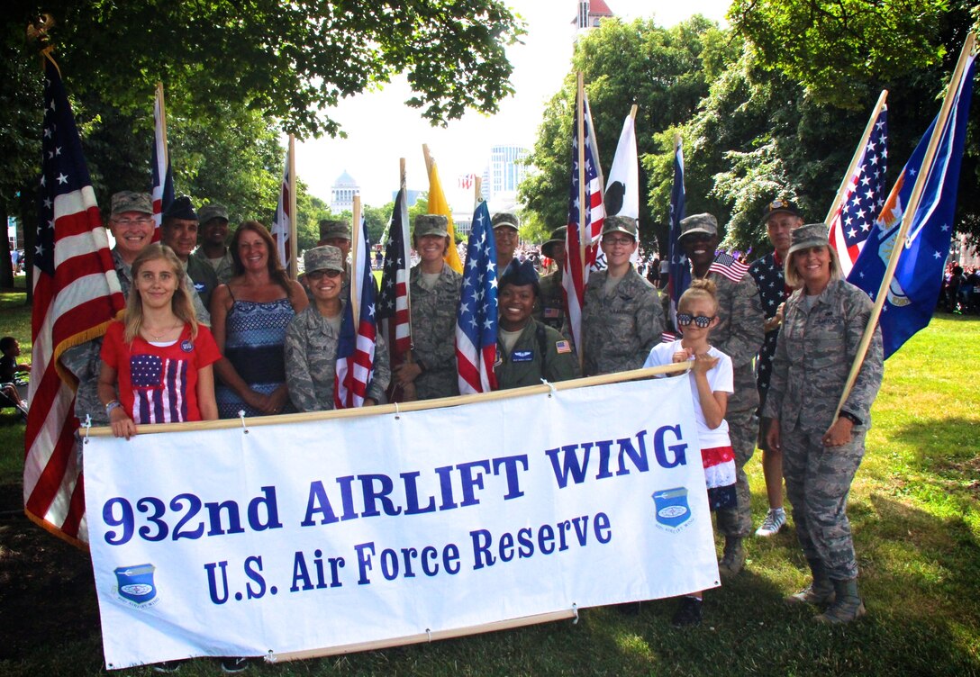 Volunteers of the 932nd Airlift Wing in Illinois gave of their time to think of the history of America's Independence Day, and consider other military veterans who went before them, those who sometimes gave the ultimate sacrifice of their lives. 932nd AW members and a few retirees worked together to fold the American flags back into proper position at the end of their parade route. The 932nd Airlift Wing had a great group of enthusiastic volunteers who carried the Air Force Reserve name on their banner and represented the unit in the popular Saint Louis parade which was televised live on local networks. The wing plans to help next in the Veterans Day parade in November also.
(U.S. Air Force photo by Lt. Col. Stan Paregien)